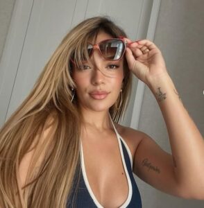 Karol G at a 2025 event, as seen on her Instagram | Karol G Net Worth 2025