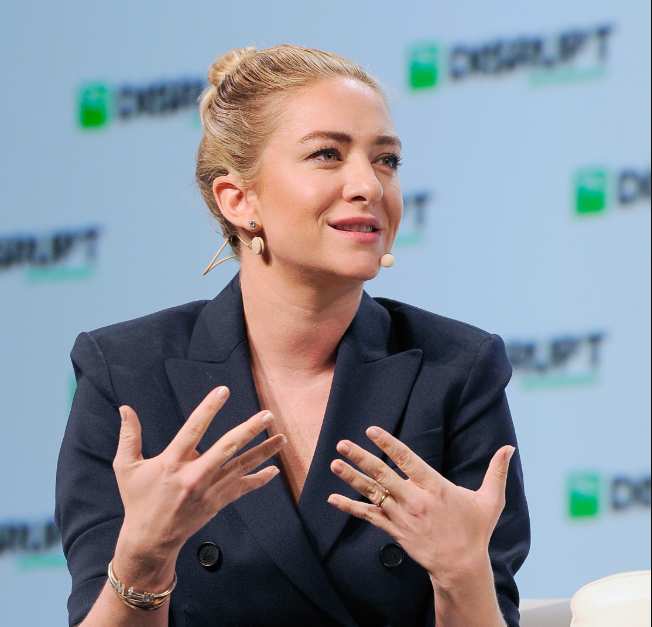 Whitney Wolfe Herd net worth profile image sourced from Wikipedia showing the Bumble founder and CEO