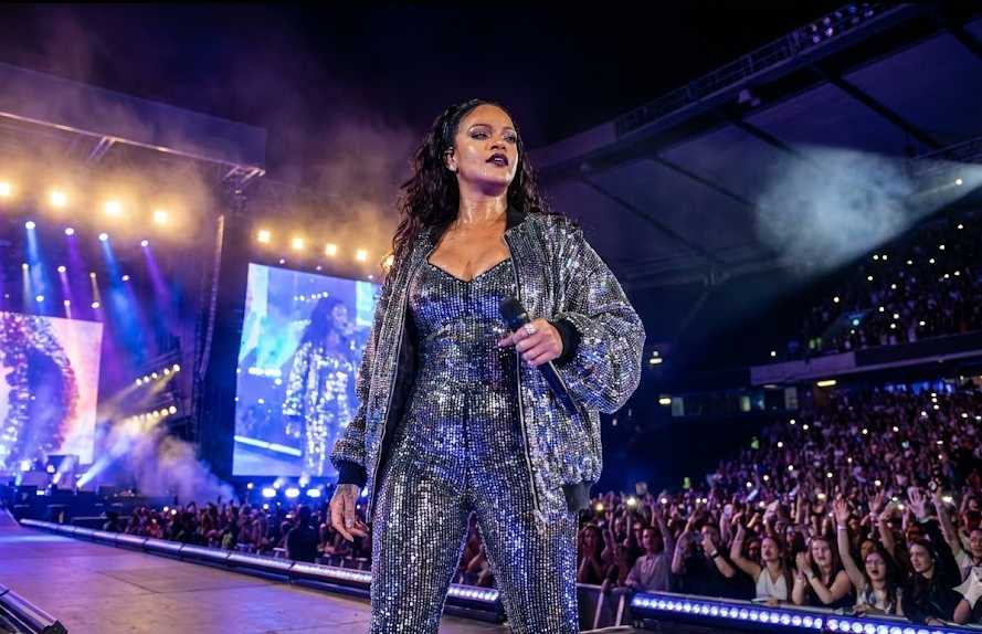 Rihanna Net Worth 2026: From Global Pop Star to Billionaire Business Leader 5 Rihanna performing live on stage during a concert in 2026, highlighting her journey from global pop star to billionaire business leader
