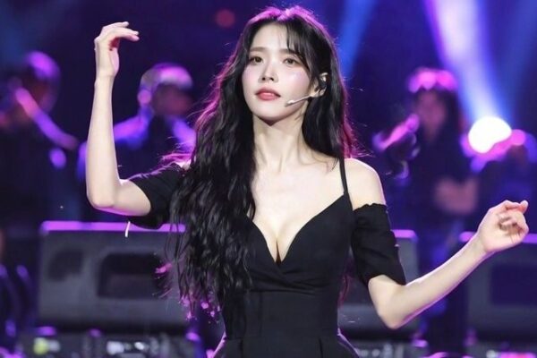 IU: Career, Influence & Net Worth (2026 Update) IU performing on stage during a live concert
