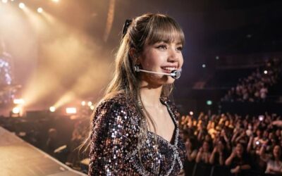 Lisa of BLACKPINK performing on a global stage, representing her international influence and worldwide popularity